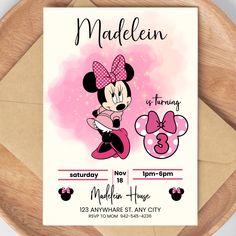 a minnie mouse birthday party with pink and black