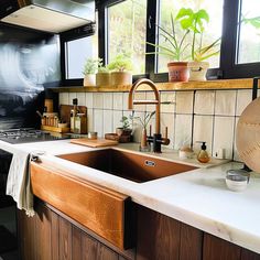 the kitchen sink is clean and ready to be used as a dishwasher or oven