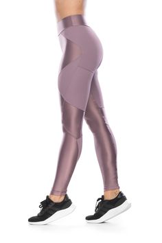 Talk about a statement legging! With high compression and support from all angles, the Versatility legging provides not only excellent mobility and breathability, but also adds style to your daily workout sesh. Made with microfiber details and Comfort Supplex®, this Legging has a mix of colors and vertical lines that lengthen the feminine silhouette, as well as allowing less friction with the skin thus providing better performance. Description Super high waistband with safety elastic and rounded Vertical Lines, Feminine Silhouette, At The Gym, Daily Workout, Geometric Patterns, Second Skin, Scarlet, Lilac, Color Mixing