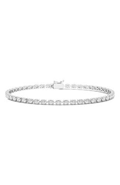 Oval-cut lab-grown diamonds are prong-set along this distinctive tennis bracelet. Total lab-grown diamond weight: 6.20ct. Color: D-F Clarity: EX-VS 14k gold/lab-grown diamond Made in the USA >Diamond Guide