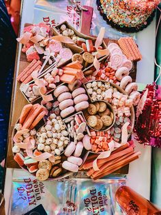 a table topped with lots of candy and candies