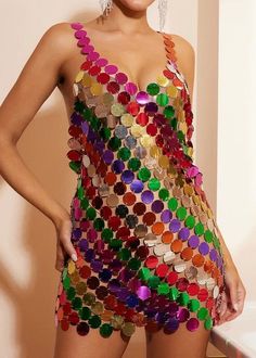 This Multicolor Rainbow Metallic Chainmail Dress is perfect for any party or festival with its stunning halter design and adjustable size that fits S-XL. Its mini length adds a touch of glamour while the chainmail fabric gives off a unique and eye-catching metallic rainbow effect. The perfect statement piece for a night out. Summer Chainmail Dress, Summer Party Chainmail Dress, Sleeveless Chainmail Party Dress, Sleeveless Chainmail Dress For Party, Multicolor Sequin Disco Mini Dress, Multicolor Sequined Disco Mini Dress, Disco Style Multicolor Sequined Mini Dress, Disco Multicolor Sequin Mini Dress, Multicolor Disco Sequin Dress For Summer