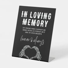 a card with the words in loving memory written on it