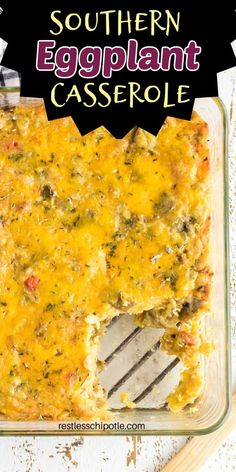 an eggplant casserole in a glass baking dish with a spatula