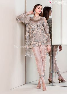 Wedding Short Shirt with Trouser Dress Pakistani is an exquisite piece of beauty that wins everyone's heart at the very first glance. Available in The USA. Elegant Hand Embellished Dress For Ceremony, Long Sleeve Embroidered Dress For Reception, Hand Embellished Embroidered Dress For Wedding, Elegant Hand-embellished Embroidered Wedding Dress, Elegant Embroidered Dress With Sequins For Wedding, Elegant Hand-embellished Wedding Embroidered Dress, Elegant Embroidered Sequin Dress For Wedding, Elegant Hand Embellished Wedding Dress, Elegant Embroidered Sequined Wedding Dress