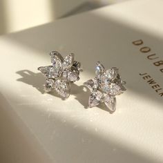 Luxury Bridal Studs for Every Day ✨💎 It gives you beautiful, attractive and outstanding jewelry experience ✨ * Everlasting Confidence * Wonderful Quality * Stay Shiny * Exquisite Fit * Over 17,000 cumulative user reviews, rating 4.8+/5 Timeless Elegance: Moissanite Cluster Earrings Experience the ultimate fusion of luxury and practicality with DOUBLE ACCENT's Moissanite Cluster Sunlit Petals Stud Earrings. Crafted for the modern bride who appreciates the beauty of opulence, these earrings are n Luxury Cluster Platinum Jewelry, Luxury Fusion Diamond Earrings, Diamond White Diamond Flower Earrings For Wedding, Crystal Flower Earrings For Anniversary, Wedding Earrings In Diamond White With Flower Shape, Wedding Cubic Zirconia Crystal Earrings In Flower Shape, Cubic Zirconia Flower Shape Bridal Earrings For Anniversary, Diamond White Floral Earrings For Wedding, Wedding Crystal Earrings With Cubic Zirconia In Flower Shape