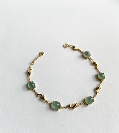 A very elegant piece of bracelet composed of 5 top grade Burmese icy green jade gemstones. The piece is also made out of solid 18k yellow gold. Unique piece of jewelry. Green Jade Bracelet, Jade Jewellery, Everyday Bracelet, Jade Necklace, Jade Bracelet, Jade Jewelry, Gold Plated Bracelets, Tennis Bracelet Diamond, Jade Pendant