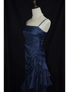 This exquisite dark blue prom gown features a vintage floral design that exudes timeless elegance. The asymmetrical hemline adds a modern twist, creating a captivating silhouette that will make you stand out at any event. Designed with delicate spaghetti straps, this dress is perfect for those special adult milestone celebrations.  Garment Size   	 		 			Size 			XS 			S 			M 			L 			XL 		 		 			Bust 			78 			82 			86 			90 			94 		 		 			Waist 			60 			64 			68 			72 			76 		 		 			Hips 			84 Dark Blue And Silver Dress, Midnight Blue Homecoming Dress, Navy Blue Dress Homecoming, Dark Blue Star Dress, 80s Hoco Dress, Cute Grad Dresses Grade 8, 2000 Dress Early 2000s, Old Hollywood Hoco Dress, Prom Dresses High School