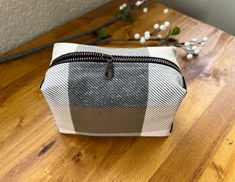 Perfect little boxy makeup bag for all your travel cosmetic essentials. It's a great little travel bag for men or women Details:  Cotton canvas main fabric and fully lined with 100% cotton fabric interfaced for support Measures approximately 5 1/4" W x 4" H x 3 1/4" D   Spot clean or gentle wash and lay flat to dry *All makeup bags are handmade so fabric pattern placement may vary Rectangular Zipper Pouch For Cosmetics And Toiletries, Rectangular Zipper Pouch For Everyday Cosmetic Storage, Rectangular Zipper Pouch For Everyday Use, White Rectangular Cosmetic And Toiletry Storage, Everyday Rectangular Cosmetic Bag With Zipper, Square Travel Cosmetic Bag With Zipper, White Rectangular Cosmetic And Toiletry Storage Gift, Rectangular White Cosmetic And Toiletry Storage Gift, Rectangular Zipper Pouch For Cosmetic Storage