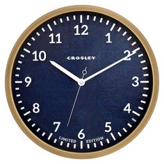 an analog clock with the word crockley on it's face and hands