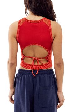 This cool cropped tank is crafted in a close-fitting silhouette with a tied-and-cutout back. 15" length (size Medium) Ties at back Crewneck Sleeveless 38% polyester, 35% recycled polyamide, 21% polyamide, 6% elastane Machine wash, line dry Made in Turkey Red Casual Tie Back Top, Stretch Crop Top Tank Top With Tie Back, Sporty Red Cropped Tops, Fitted Crop Top With Tie Back And Tank Straps, Red Cropped Fitted Tank Top, Red Fitted Cropped Tank Top, Red Sporty Crop Top For Spring, Sporty Red Crop Top For Spring, Stretch Red Cropped Tank Top