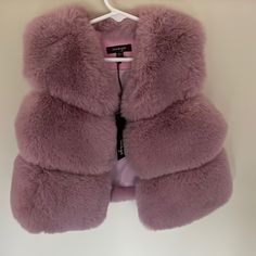 Girls Faux Fur Lavender Vest. Nwt. Size 8. Fluffy Pink Outerwear For Spring, Purple Outerwear For Cold Weather In Spring, Fluffy Pink Spring Outerwear, Cute Purple Winter Outerwear, Purple Faux Fur Coat For Winter, Winter Purple Faux Fur Coat, Cute Fitted Winter Outerwear, Cute Fitted Outerwear For Winter, Purple Faux Fur Outerwear For Winter