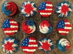 cupcakes with red, white and blue frosting in the shape of american flags