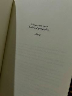 an open book with a quote on it