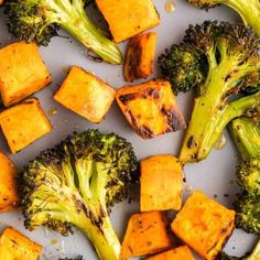 broccoli and tofu on a sheet of baking paper