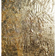 an image of gold foil textured with metallic flecks on it's surface