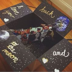 four graduation caps with pictures on them sitting on top of a wooden floor in front of a wall