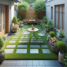 an outdoor patio with grass and potted plants