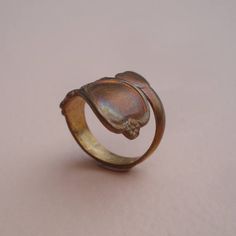 PLEASE NOTE: Rings may have an aged patina to them. Size: Hearts on end are 13mm and 6mm. Quantity: 2 Material: Brass *These metal settings are Lead & Nickel FREE* PLEASE NOTE: Please read my store policies before agreeing to purchase LINK TO POLICIES --> http://www.etsy.com/shop_policy.php?user_id=5963982 Antique Adjustable Bronze Rings, Vintage Open Heart Ring For Promise, Vintage Open Heart Promise Ring, Adjustable Bronze Rings With Antique Finish, Vintage Brass Open Ring Jewelry, Vintage Hand Forged Ring Jewelry, Vintage Hand Forged Jewelry Ring, Vintage Adjustable Metal Rings, Vintage Hand Forged Ring