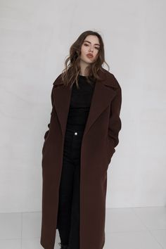 Oversized brown coat Brown Coat Women Description: This brown cashmere blend oversized coat features a wide collar, midi length, and lowered shoulders line. Comfortable side pockets and a belt that emphasizes the waist.We can make our coats warmer to suit for a cool winter and weather below 0°C. If you want us to do this, PM us, and we will reply you as soon as possible. Details: Wrap style Lowered shoulders line Two pockets Belt Сomposition: Cashmere 80% Wool 20%Lining viscose 100% Long Womens Coat Winter, Brown Coat Outfit Winter, Long Brown Coat Outfit, Brown Long Coat Outfit, Wedding Skirt Top, Brown Coat Outfit, Long Brown Dress, Autumn Coats, Long Brown Coat