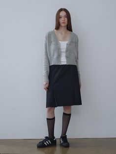 This is a trendy and unique skirt by TWENTY FOUR T that is made out of high quality and sturdy fabric. With refined design detail and trendy mood, you can style it for your casual and trendy daily outfit.- Geek chic mood- Elastic waistbakd- YKK zipper closure- Logo embroidery detail on the pocket Casual Mini Skirt For Office In Winter, Trendy Gray Skirt For Fall, Trendy Gray Fall Skirt, Trendy Winter Office Skirt, Casual Gray Skirt For Office, Chic Winter Cotton Mini Skirt, Geek Chic Outfits, Unique Skirt, Unique Skirts