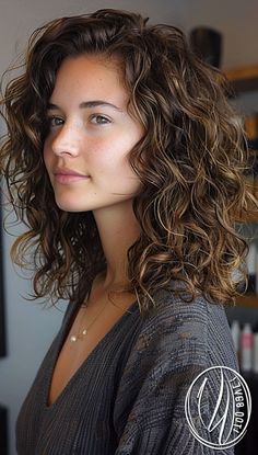 Layered haircuts have long been an all-time favorite as they complement various hair types and lengths without sacrificing versatility or stylishness. With the right layers, anyone can add volume, texture, and flow to their hair, #curlyhair Long Curly Lob Haircut, Shoulder Length Wavy Hair Natural, Haircut For Short Curly Hair For Women, Medium Length Fine Curly Hair, Curly Collarbone Length Hair, Shoulder Length Hair For Curly Hair, Short Curly Haircuts Shoulder Length, Haircut Wavy Curly Hair, Curly Mom Haircut