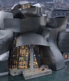 an artistic building in the middle of a city