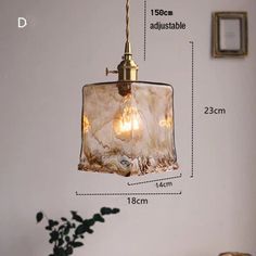 an image of a light fixture with measurements