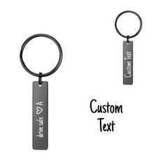 two key chains with the words custom text on them