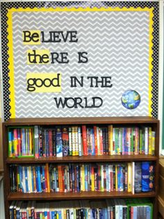 a book shelf with books on it and a sign that says, believe there is good in the world