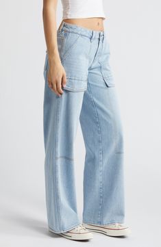 Make a statement in Y2K-inspired nonstretch jeans flaunting a low-rise waist, full-length wide legs and trend-right cargo pockets. 33" inseam; 23" leg opening; 10" front rise; 14" back rise (size 29) Zip fly with button closure Front slant pockets; back flap-patch pockets 100% cotton Machine wash, tumble dry Imported Spring Mid-rise Utility Flare Jeans, Streetwear Full-length Flare Jeans With Pockets, Streetwear Full Length Flare Jeans With Pockets, Spring Cargo Jeans With Multiple Pockets, Mid-rise Cotton Utility Flare Jeans, Streetwear Full-length Flare Jeans, Mid-rise Cotton Flare Jeans In Utility Style, Spring Full-length Cargo Jeans With Multiple Pockets, Medium Wash Wide Leg Utility Flare Jeans