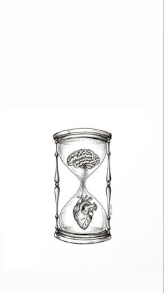 an hourglass with a human heart in it