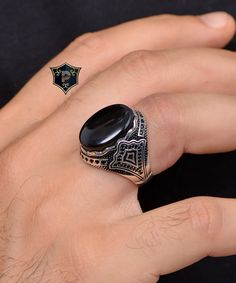 "Natural Black Onyx Silver Ring, Handmade Gemstone Ring, 925 Sterling Silver Ring, birthday gift, Turkish Ring, Ottoman Jewelry ✦ Details ✦ * Material: 925 Sterling Silver * Gemstone: Onyx * Weight: 12.50 grams * The size of the stone: 15x20 mm. * Sides oxidized, decorated with Garnet stones and Micro Zircon stones. * Stamp: 925 * Available sizes; 5 US to 16 US. Contact me if you need any other size! ✦ Shipping ✦ * Processing time: 1-3 business days. * This item ships from my Turkish workshop in Istanbul. * Add your phone number in address box for a smoother delivery. That makes courier personnel's job easier.  ✦ Packaging ✦ * Comes with a luxury gift box and a jewellery cleaning cloth. ✦ Returns, Exchanges ✦ * Return option available for 30 days after the delivery. * The product has to be Black Engraved Ring With Gemstone For Gift, Engraved Black Rings For Gift, Black Sterling Silver Engraved Ring Gift, Classic Black Crystal Ring For Gift, Black Rings Gift, Black Sterling Silver Signet Ring For Gift, Round Signet Ring With Stone Setting As Gift, Black Hallmarked Rings For Gift, Hallmarked Black Rings For Gifts