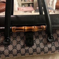 Gorgeous And Unique Vintage Gg Monogram Shoulder Bag With Black Leather Trims And Bamboo Exterior Details. Interior Is Cloth. Excellent And Very Clean Condition. Gg Monogram, Exterior Details, Cell Phone Holster, Phone Holster, Jelly Shoes, Underwater Photography, Walker Boots, Gucci Handbags, Blush Makeup