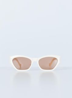 Retro sunglasses  Cream frames  Beige tinted lenses  Moulded nose bridge  Subtle cat eye design  Lens CAT. 0  No UV protection  Length: 14.5 / 5.70”  Height: 4.5cm / 1.77” Cat Eye Design, Subtle Cat Eye, Winter Sunglasses, Festival Shop, Sweatshirt Set, Eye Design, Nose Bridge, Retro Sunglasses, Sunglasses Shop