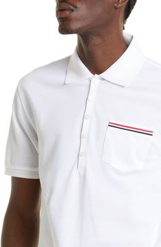 A tipped chest pocket and button-down side vents add sporty sophistication to a pique polo in soft mercerized cotton. 26" front length (size 2) Five-button placket Short sleeves Chest pocket Step hem with button side vents 100% cotton Dry clean or hand wash, dry flat Made in Japan Men's Designer Classic Polo Shirt With Buttons For Work, Classic White Polo Shirt For Business Casual, White Polo Shirt With Striped Collar For Workwear, Business Casual Polo Shirt With Spread Collar, Classic Polo Shirt With Button Closure And Spread Collar, Modern Formal Polo Shirt With Polo Collar, Classic Polo Shirt With Buttons And Collared Neckline, Classic Polo Shirt With Buttons, Classic Formal Polo Shirt With Fold Down Collar