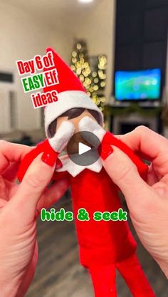 someone is holding an elf doll in their hand and it's saying, day 6 of easy elf ideas hide & seek