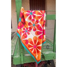 Add some retro vibes with our Funky Floral Wild Rag! This rag features a vibrant floral design with oranges, pinks, turquoise & cream. It can even be worn as a top, belt, headscarf AND so many other ways! Appx. 36" x 36" 100% Polyester Retro Multicolor Summer Scarves, Bohemian Orange Scarf For Beach, Vintage Summer Scarves For Festivals, Retro Multicolor Scarves For Spring, Vintage Multicolor Scarves For Festival, Vintage Summer Festival Scarves, Vintage Scarves For Summer Festivals, Vintage Scarf For Spring Festival, Swimsuit Jewelry