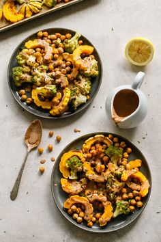 two plates filled with chickpeas and broccoli next to a serving dish