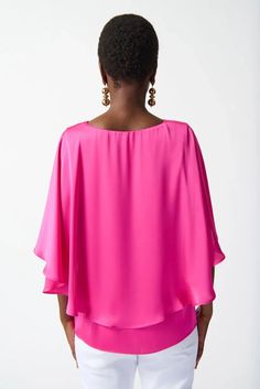 The epitome of effortless glamour, this cape top flawlessly fuses luxurious texture and contemporary design. The V-neck and statement three-quarter length sleeves create an alluring and sophisticated silhouette on this exquisite satin garment. The true essence of this piece lies in the elbow-length cut, an embodiment of modern elegance that billows with every step you take. DETAILS & CARE 100% Polyester Satin fabric V-neck Three-quarter sleeves Unlined Hand wash in cold water with like colors Do Cape Top, Cape Tops, Stylish Blazer, Leopard Print Scarf, Drape Sleeves, Professional Wardrobe, Flowy Sleeves, Joseph Ribkoff, Everyday Wardrobe