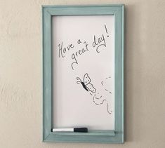 a white board with writing on it that says have a great day and a butterfly