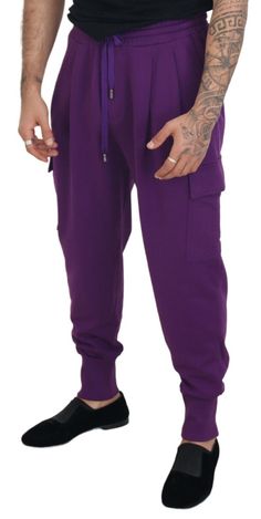 DOLCE & GABBANA Gorgeous brand new with tags 100% Authentic Dolce & Gabbana cargo sweatpants crafted from pure cotton. Style: Casual sport gym sweatpants Color: Purple Fitting: Regular fit Four front and two back pockets with zipper closure Stretch waist band with pull string closure Logo details Made in Italy Very exclusive and high craftsmanship Material: 100% Cotton Gym Sweatpants, Cargo Sweatpants, Casual Sport, Jogging Pants, Dolce E Gabbana, Sport Gym, Versace Jeans, Fashion Website, Guess Jeans