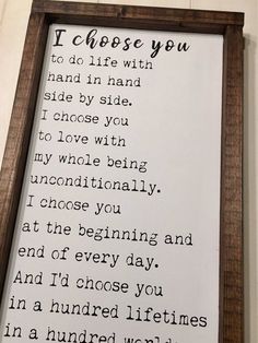 a wooden framed sign that reads i choose you to do life with hand in hand side by side