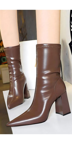 Discover the perfect pair of boots with Isabella's High-Shine Brown Ankle Boots. These chic and elegant boots feature a luxurious shine and a versatile chocolate brown color, making them ideal for any outfit and occasion. With a comfortable 3.7-inch block heel and a sleek pointed toe, these boots are designed for style and stability. Elegant Boots, Chocolate Brown Color, Chocolate Brown Colour, Color Making, Chic And Elegant, Brown Ankle Boots, Chocolate Brown, Brown Color