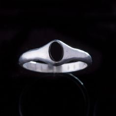 Oval shape mini signet ring the ring is made in solid sterling silver, the D shape band is 3.5 mm wide, the smoothed bezel setting enclose the oval shape plaque of onyx measuring 6 mm x 4mm. The simple and the sleek design is made to be comfortable  for every day wear and to be neat  for any outfit. This Product is a Made to Order, before buying please contact me for details Sterling Silver Signet Ring With Polished Oval Cabochon, Sterling Silver Oval Cabochon Signet Ring With Polished Finish, Oval Sterling Silver Stackable Rings With Polished Finish, Silver Oval Cabochon Signet Ring, Silver Oval Cabochon Signet Ring With Polished Finish, Minimalist Silver Onyx Signet Ring, Classic Sterling Silver Oval Cabochon Ring, Classic Sterling Silver Ring With Oval Cabochon, Silver Sterling Signet Ring With Oval Cabochon