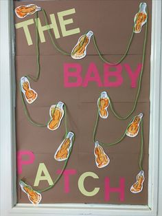 a bulletin board with the words, the baby patch and carrots attached to it