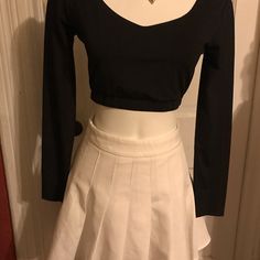 2 Pc Cute Casual Outfits ( Electric Splits White Skirts And Nlk. Tops. Great Condition Clean And Smoked Free. Measurements: Size 2 Tops : It’s Stretchable Fabric Materials Length: 13” Long Wide: 13” Shoulder:14” Sleeves: 22” Bustline: 32 Skirts: Length: 15” Long Waistline: 26” White Fitted Skort For Fall, Fitted White Skort For Fall, White Cotton Mini Skirt For Fall, Fitted White Tennis Skirt For Fall, White Stretch Mini Skirt For Fall, White Cotton Skort For Fall, Fitted Cotton Skort For Night Out, Fitted Cotton Tennis Skirt For Fall, White Mini Skirt For Fall Night Out