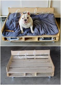 a dog sitting on top of a bed made out of pallets and wooden crates