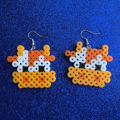 New Handmade Perler Bead Orange Cow Earrings. The Cows Are About 1.5 Inches In Height And 1.75 Inches In Width. Cow Perler Bead Patterns, Perler Bead Cow, Halloween Perler Beads, Perler Earrings, Cow Earrings, Pearl Beads Pattern, Perler Ideas, Beads Pattern, Fuse Bead Patterns