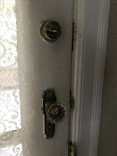 an open door with two knobs on it